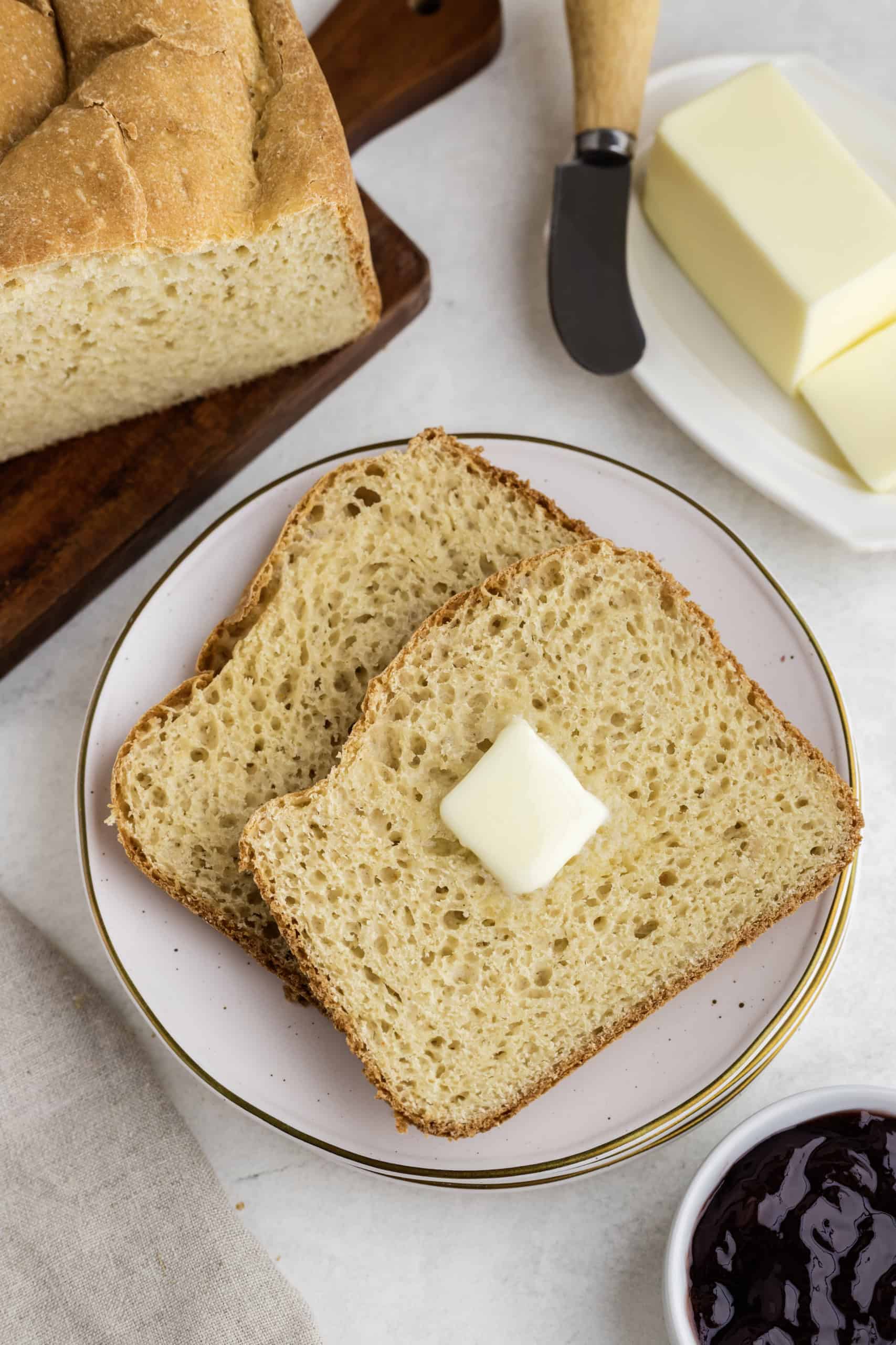 two slices of bread with butter on top
