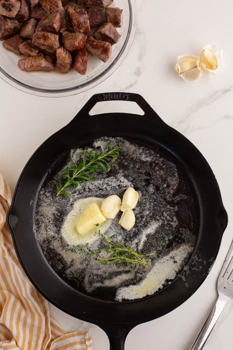 garlic and butter in a cast iron pan