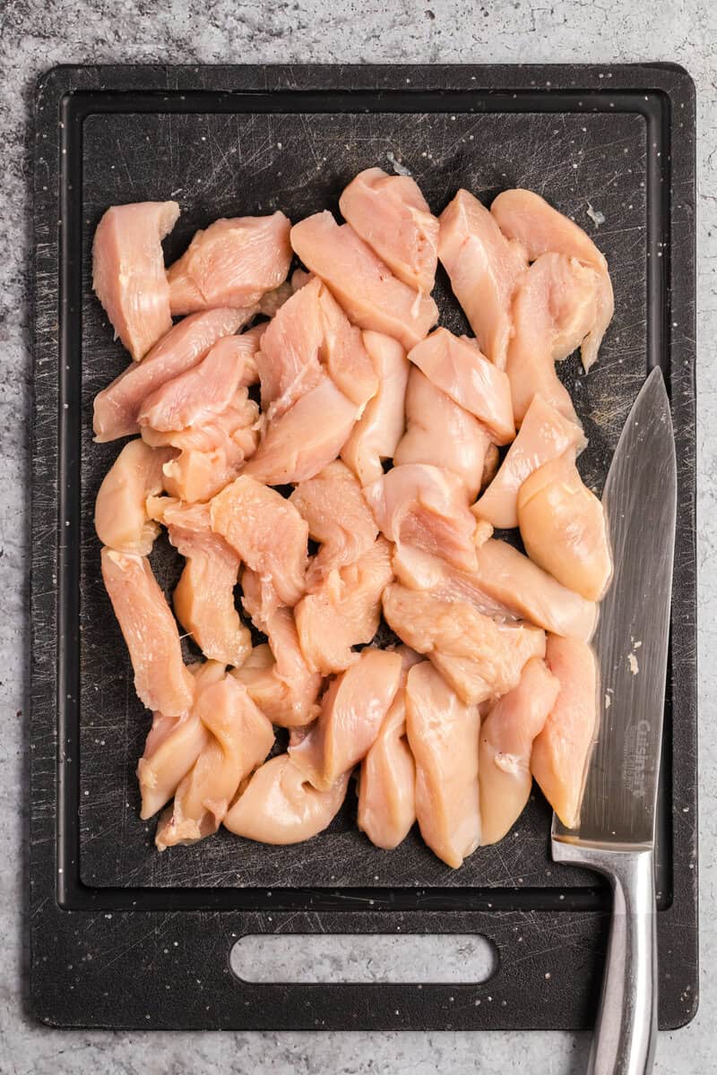 raw chicken on sheet pans