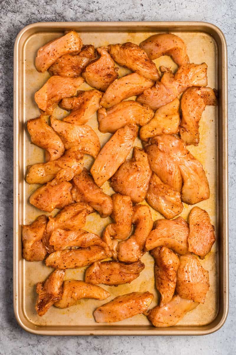 marinated chicken on a sheet pan