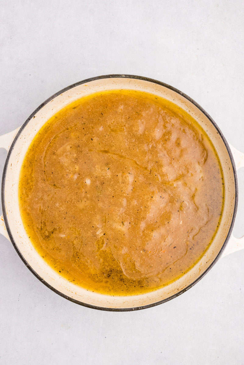gravy for chicken thighs getting thick in a dutch oven