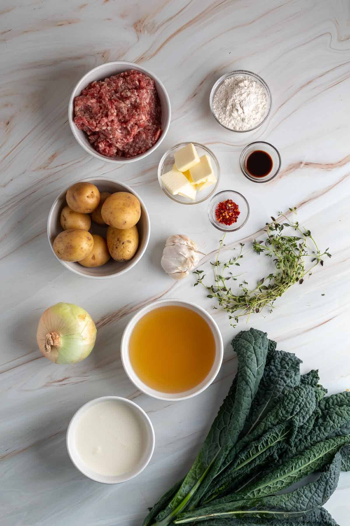 ingredients in bowls for creamy italian sausage soup