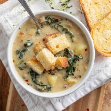italian soup with crusty croutons on top in a bowl