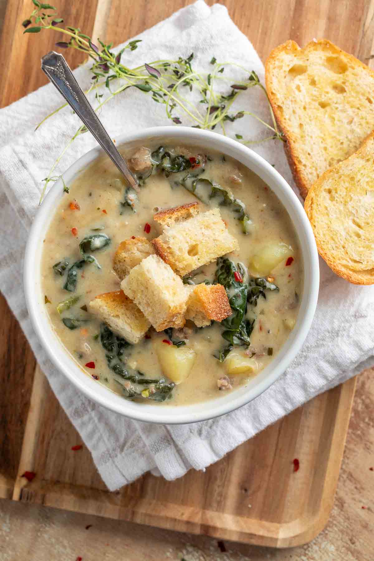 italian soup with crusty croutons on top in a bowl
