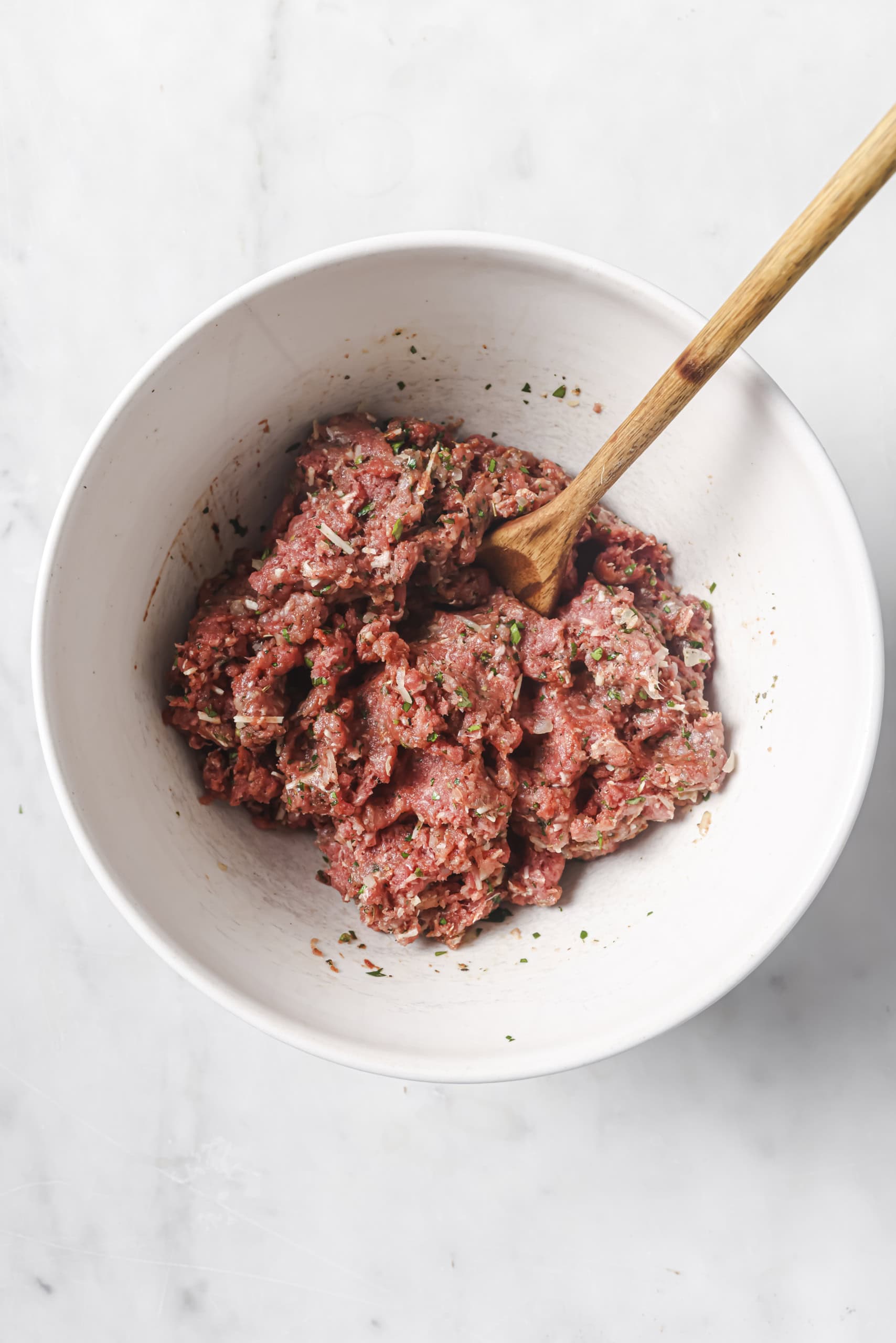 ground meat mixture in a bowl with spices