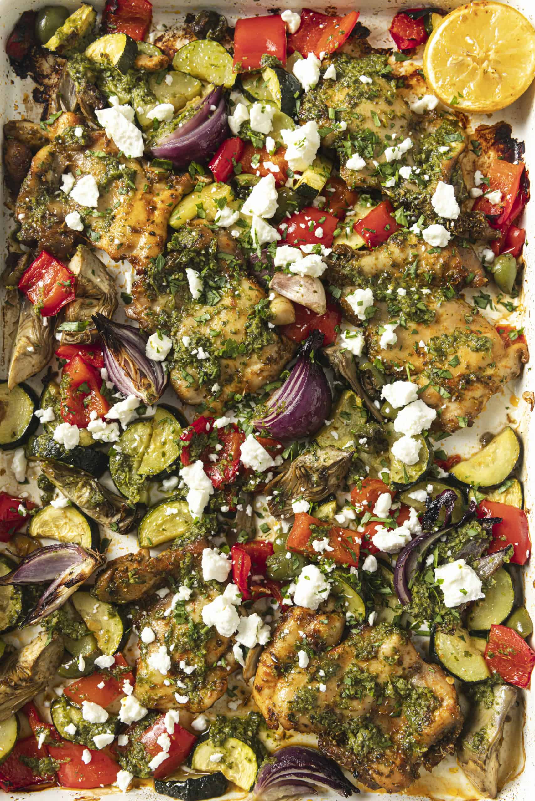 Greek sheetpan chicken topped with feta