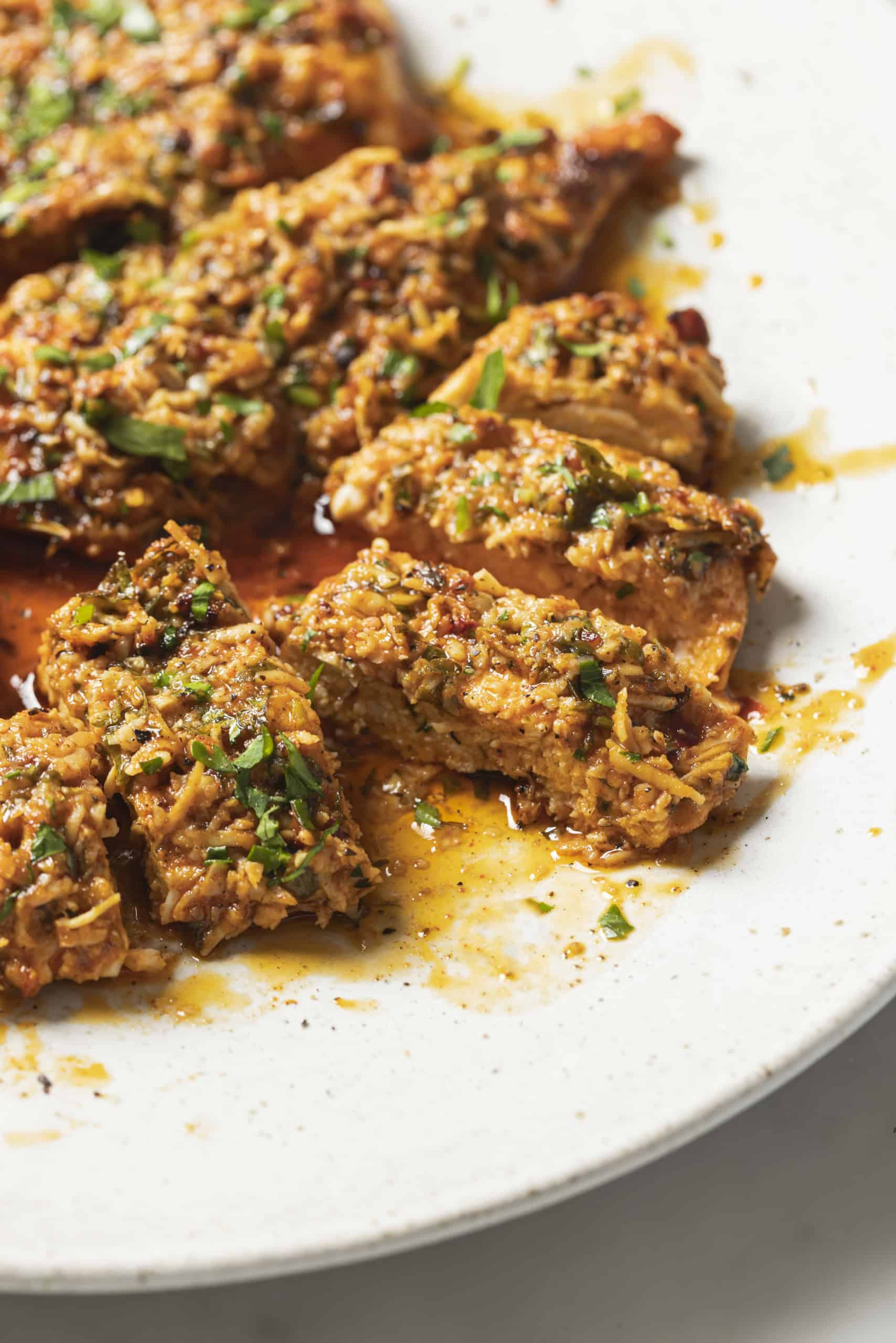 tender parmesan chicken on a plate