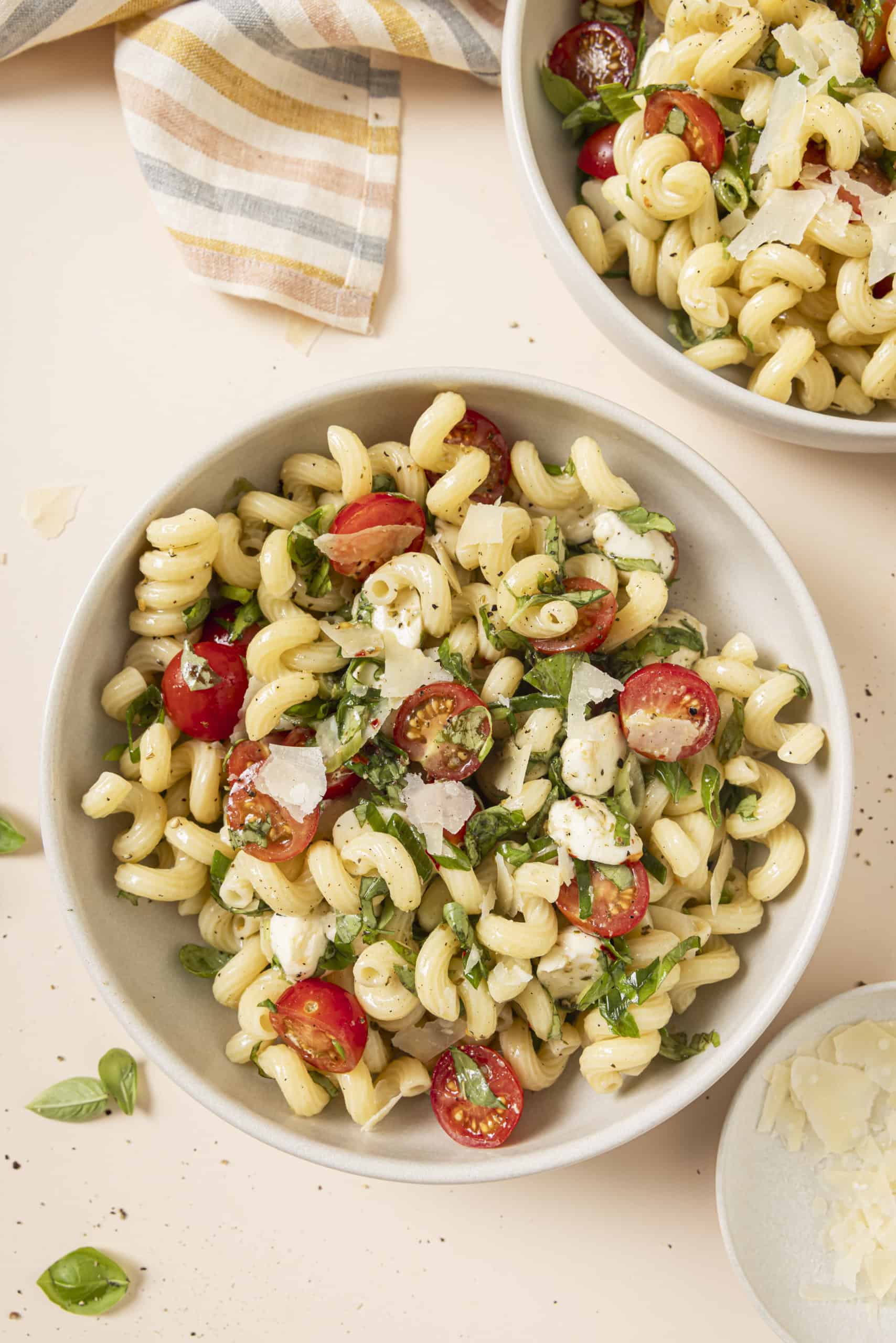 caprese pasta salad in a big white bowl
