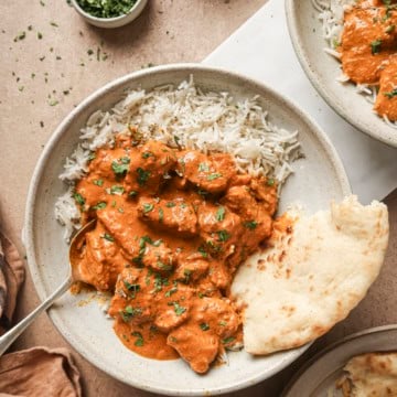 Chicken tikka masala in a bowl with rice.