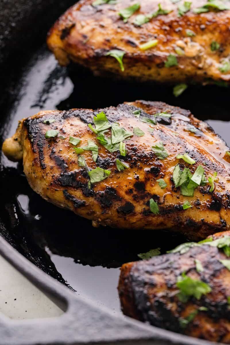 chicken breasts in a cast iron skillet