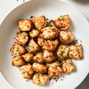 cooked air fryer chicken bites on a plate