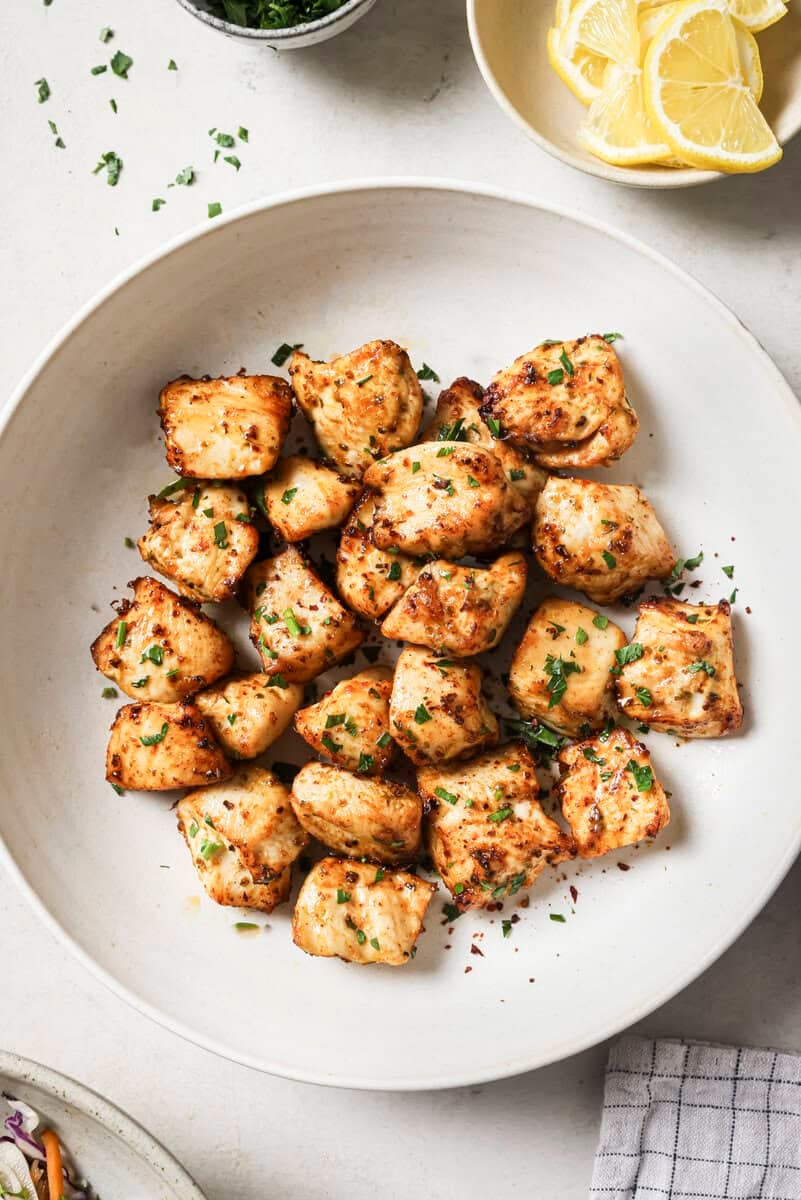 cooked air fryer chicken bites on a plate