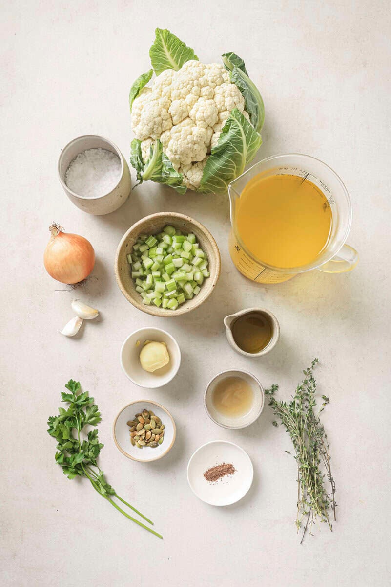 ingredients in small bowls for cauliflower soup