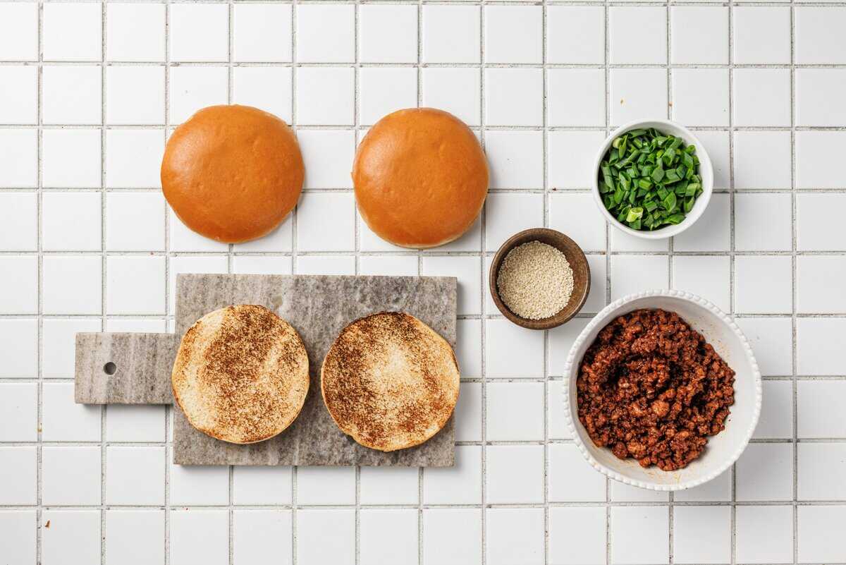 toasted buns with ingredients on the side