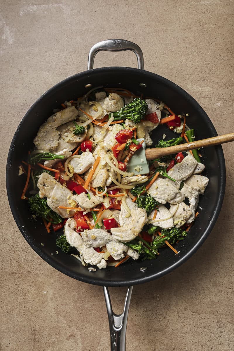 sauce added to skillet for stir fry