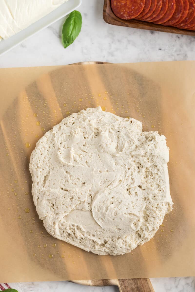 gluten free bread dough on a wooden board