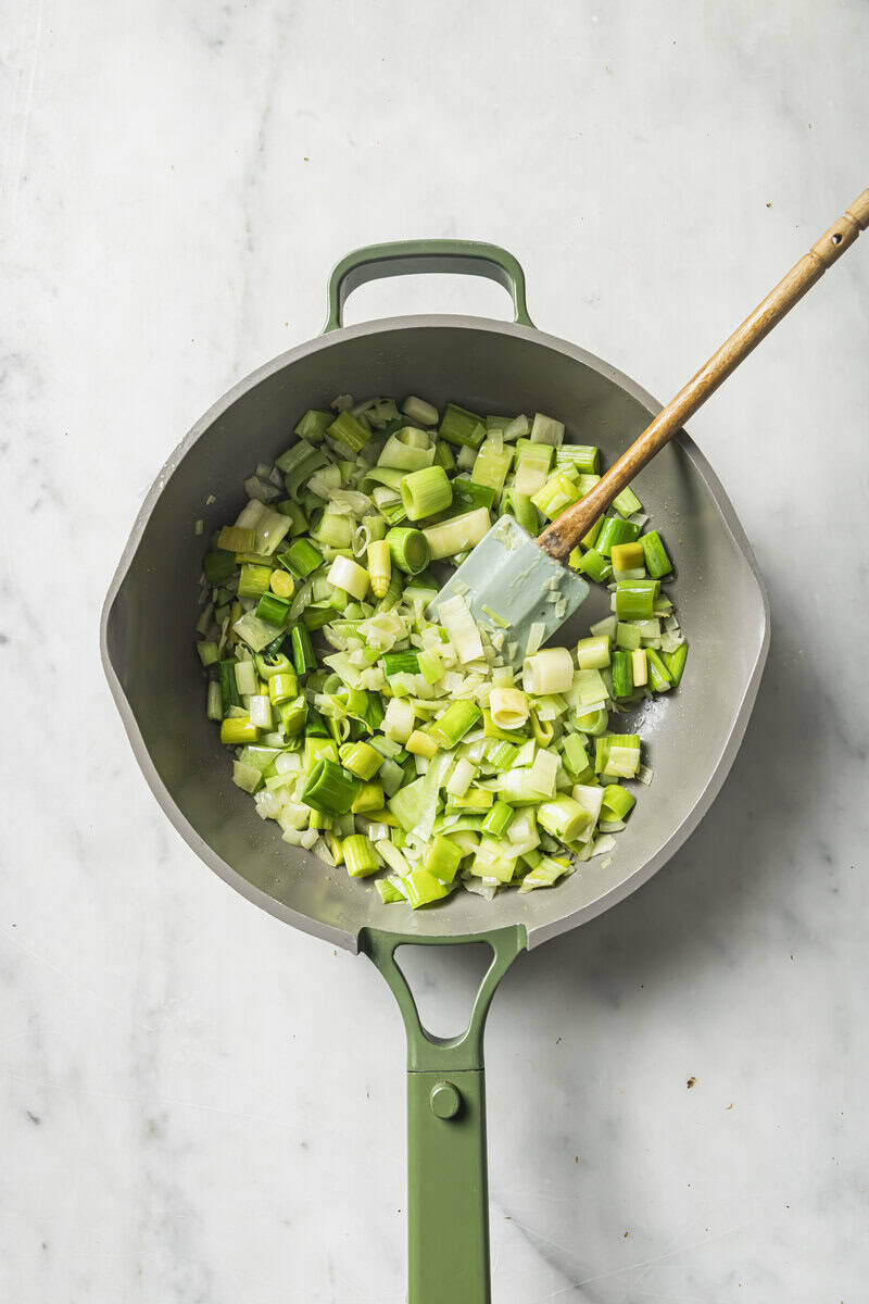 celery and onion in a saute pan