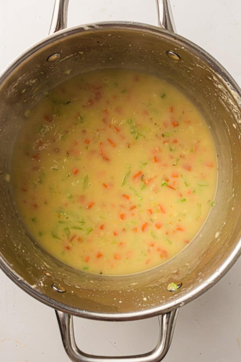 broth added to pot with vegetables