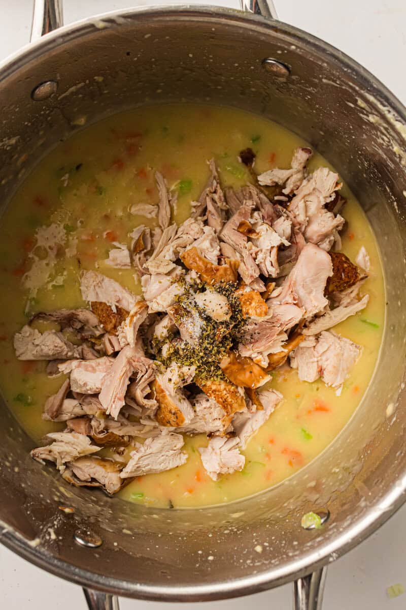 chicken added to broth and vegetables 