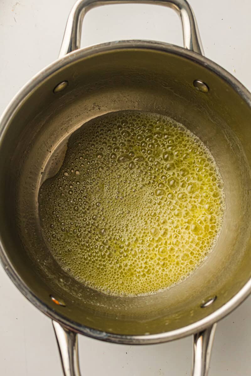 butter melting in pot for macaroni and cheese