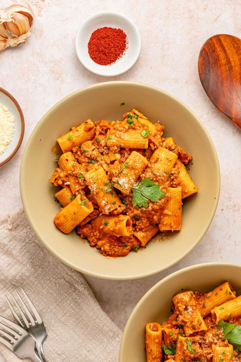 pasta with chorizo sauce in a bowl