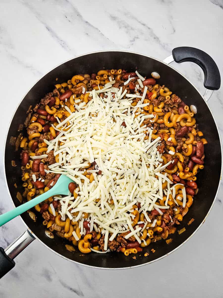 all ingredients in skillet for chili mac