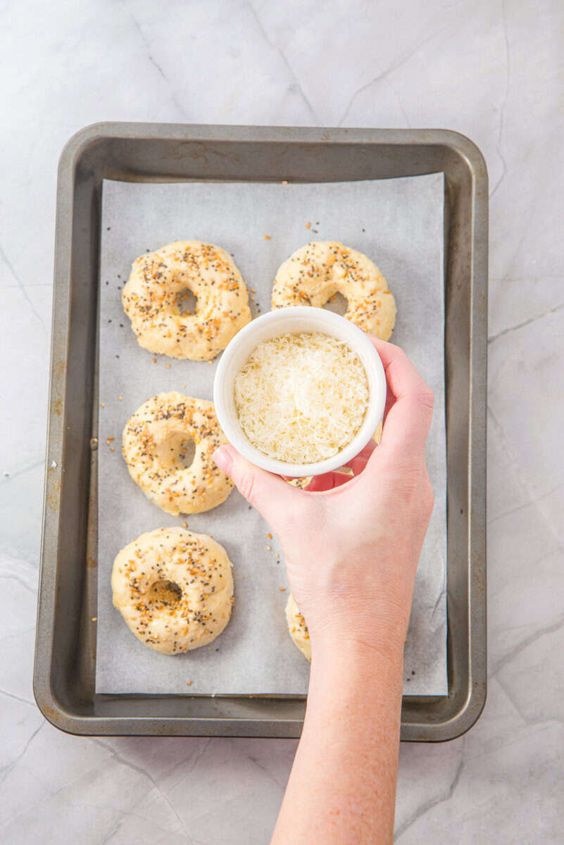 gluten free almond flour bagels with fresh parmesan on top