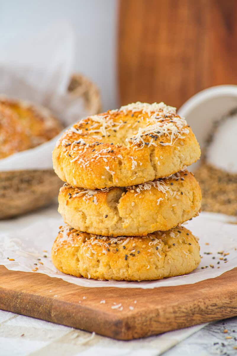 three bagels stacked up on a plate