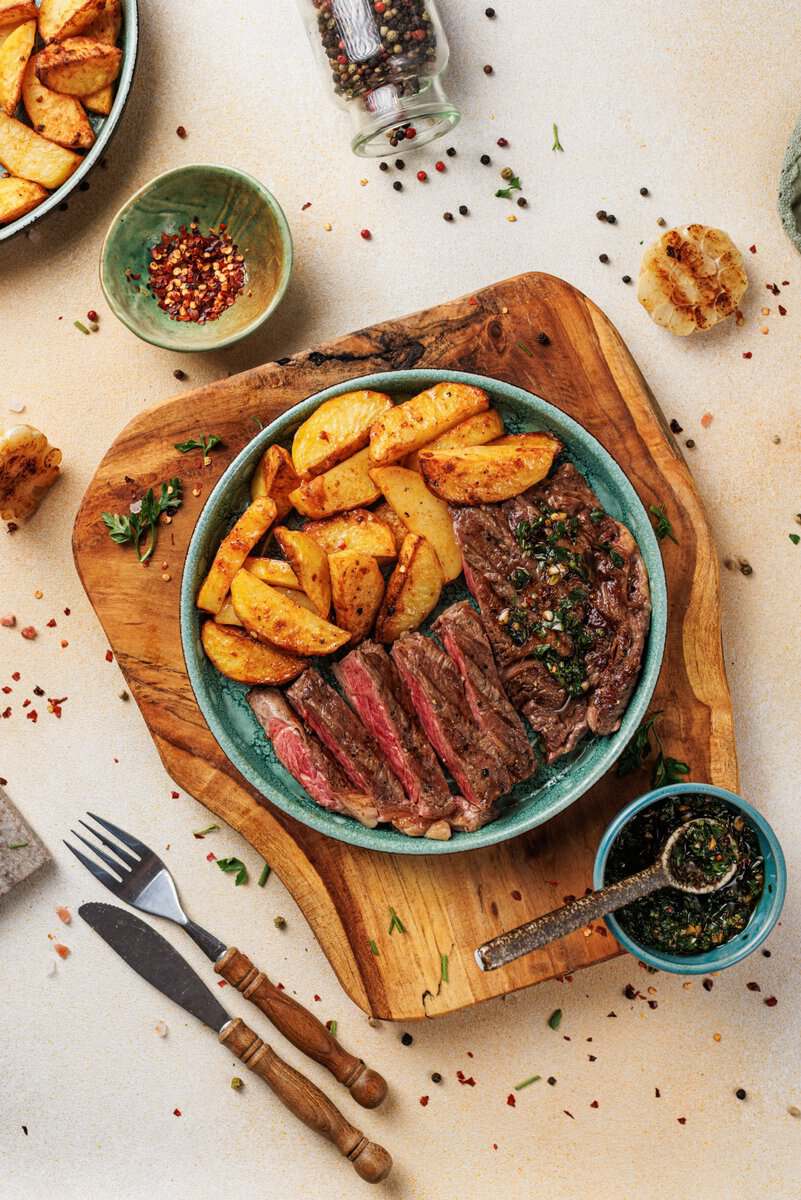 Chimichurri Steak and Garlic Frites on a plate 
