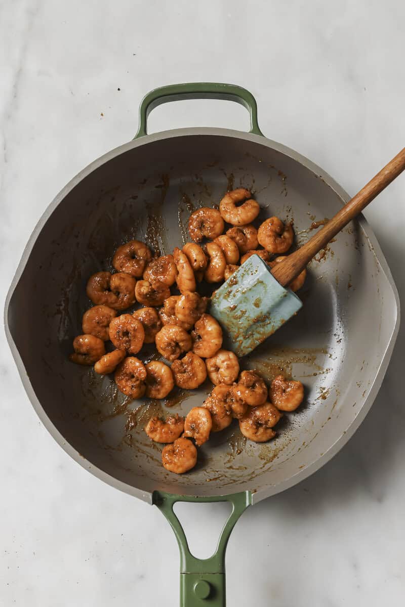 shrimp sauteing in a skillet