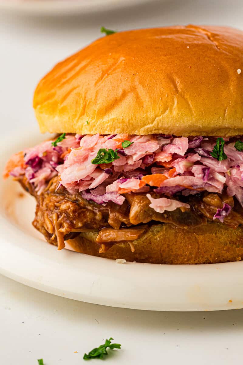 slaw on bun with pulled pork