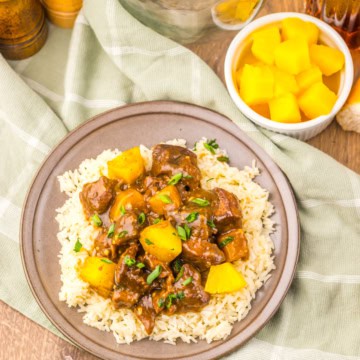 Slow Cooker Pineapple Teriyaki Steak Bites on a white plate