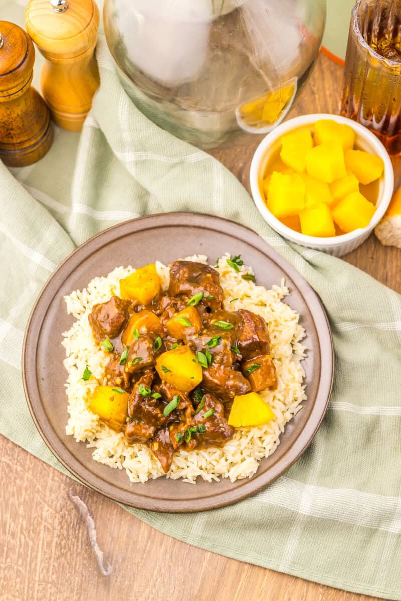 Slow Cooker Pineapple Teriyaki Steak Bites on a white plate
