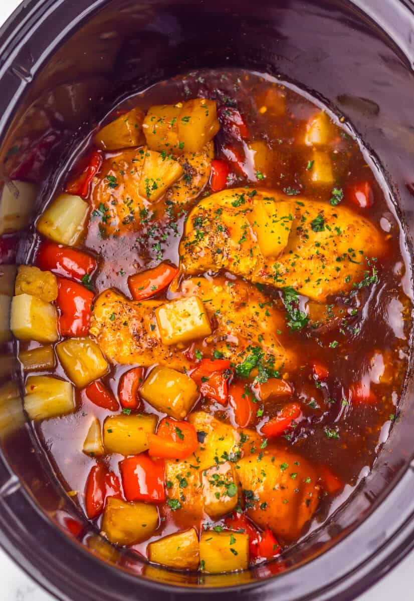 cooked chicken and peppers in the slow cooker