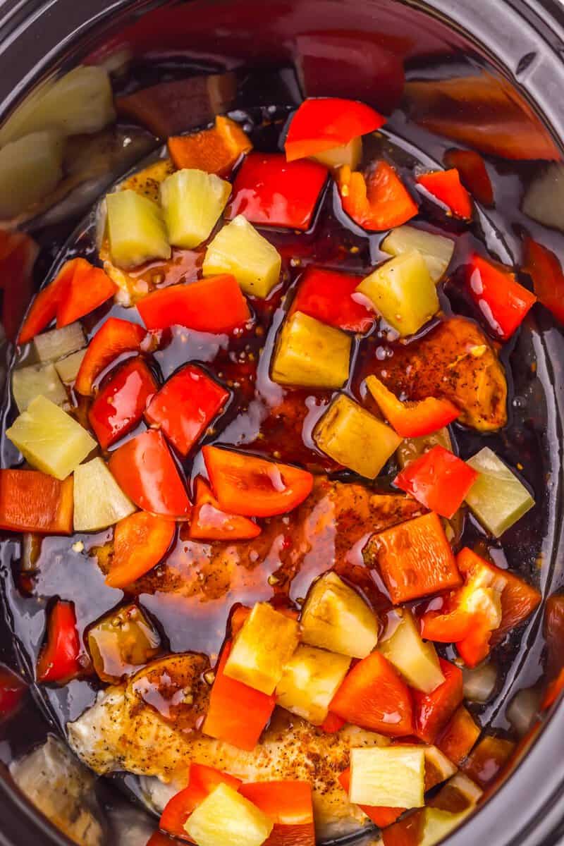 chicken pineapple peppers and sauce in the crockpot