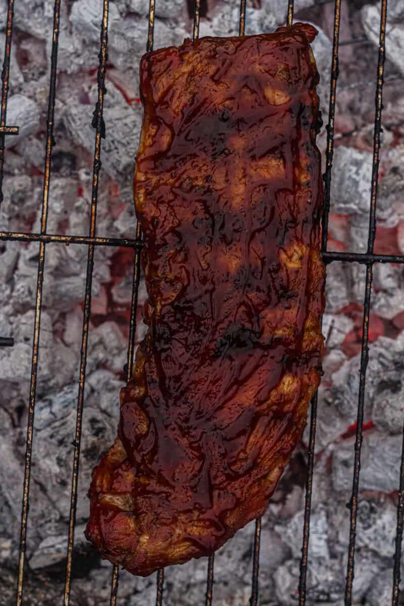 ribs with sauce on grill