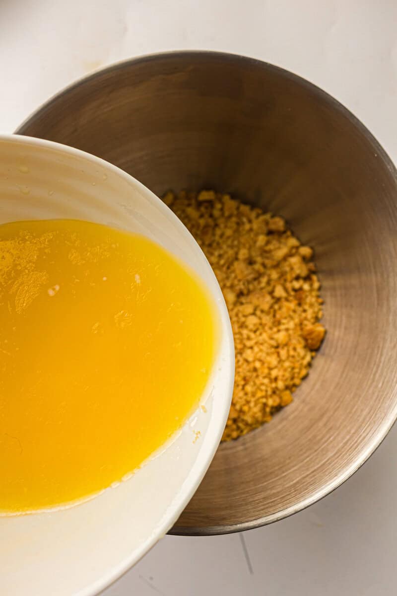 butter and graham cracker crumbs