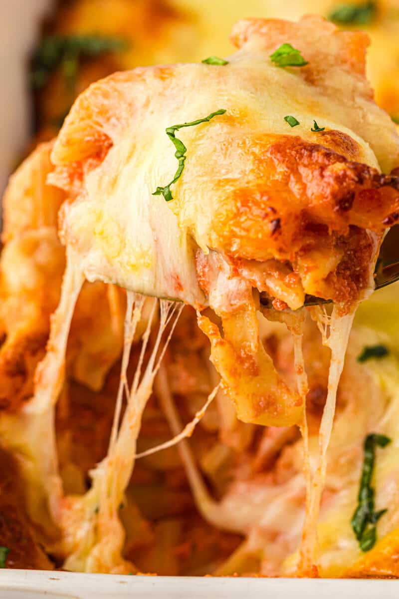 ziti on a spoon with melted cheese