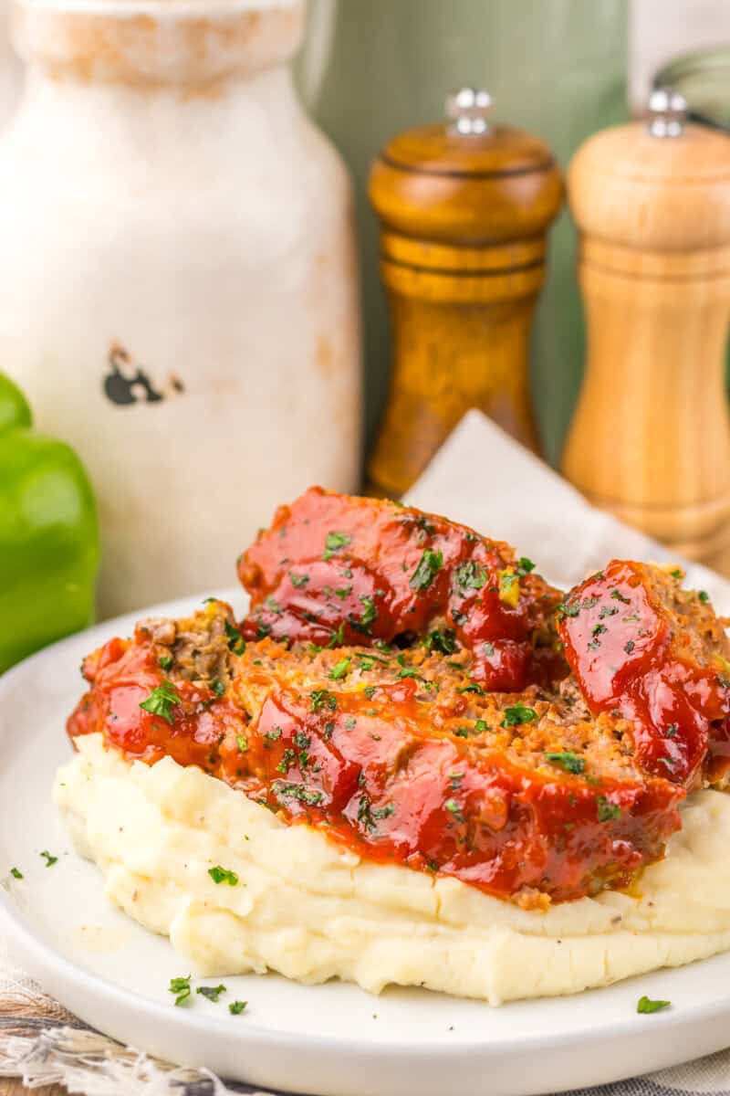 Slow Cooker Cracker Barrel Chicken Meatloaf  over mashed potatoes