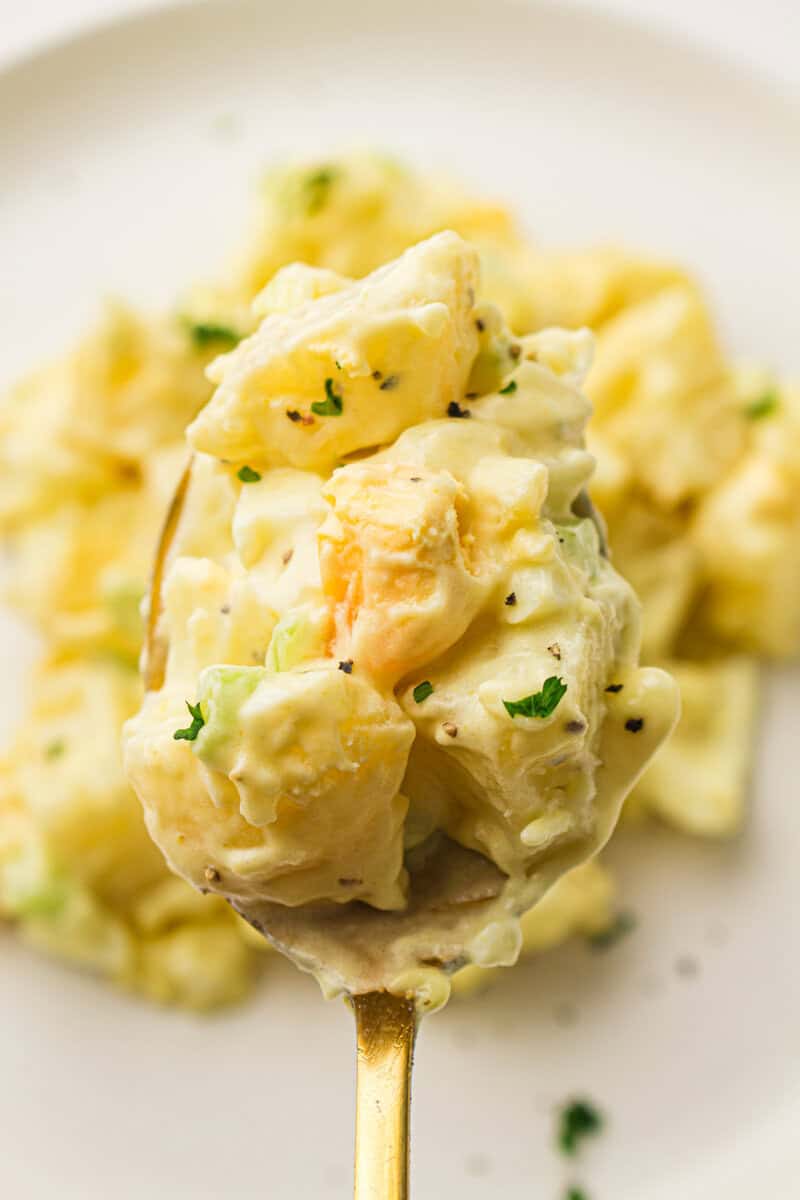 potato salad on a plate with a fork