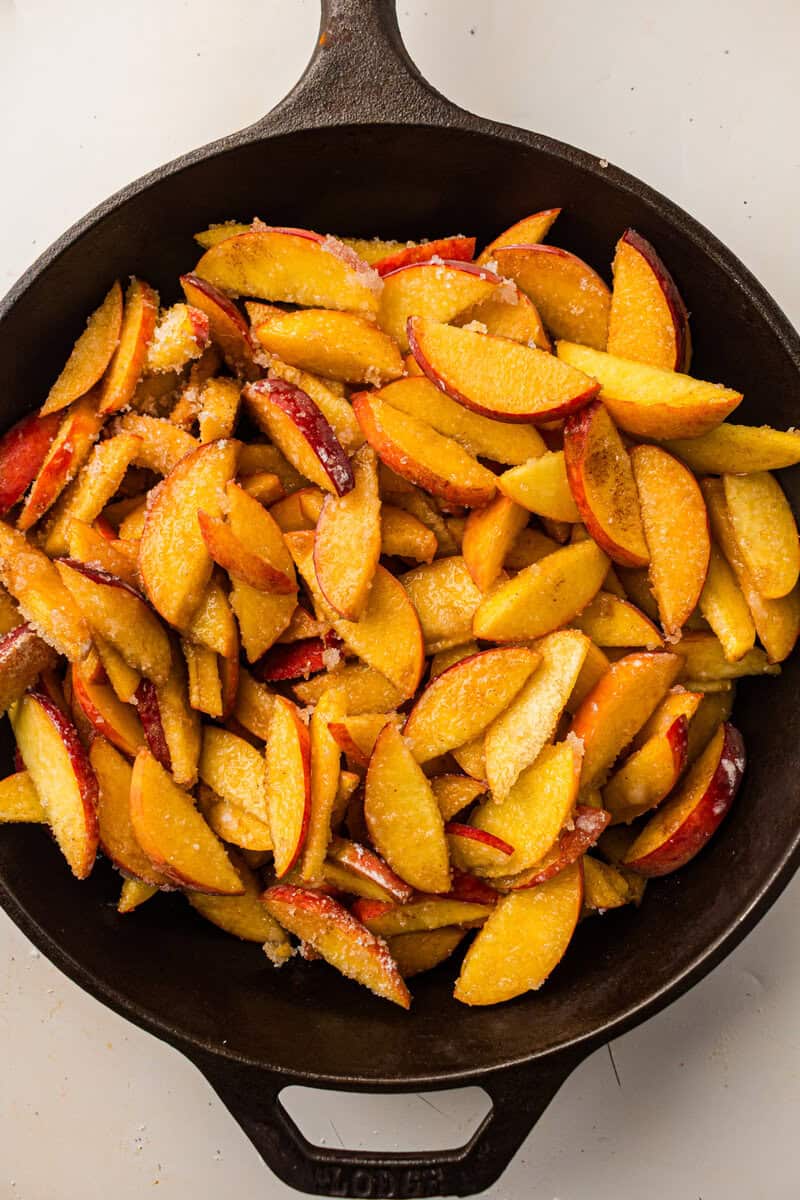 peach mixture in a cast iron skillet