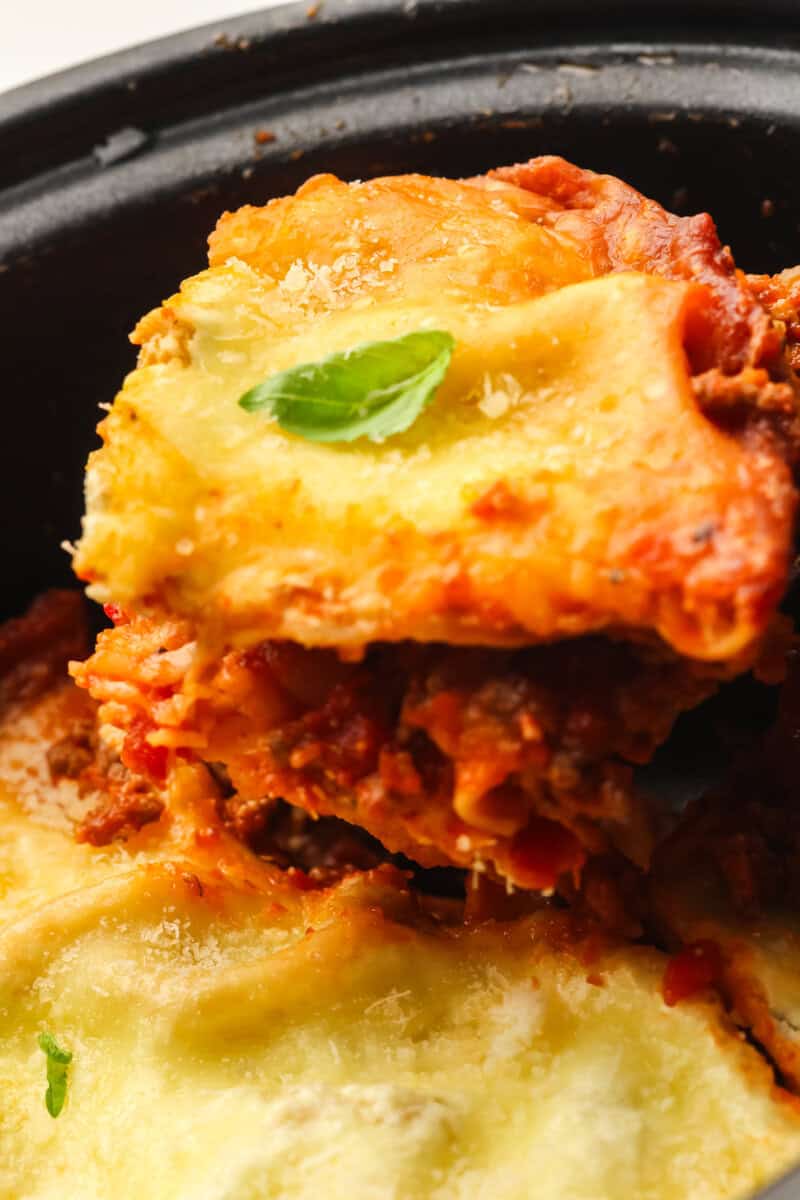 spoon with serving of lasagna
