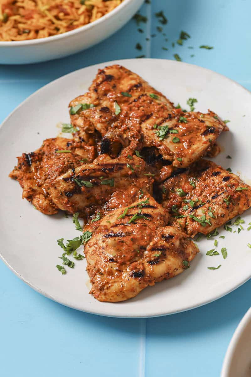 grilled chicken thighs on a plate