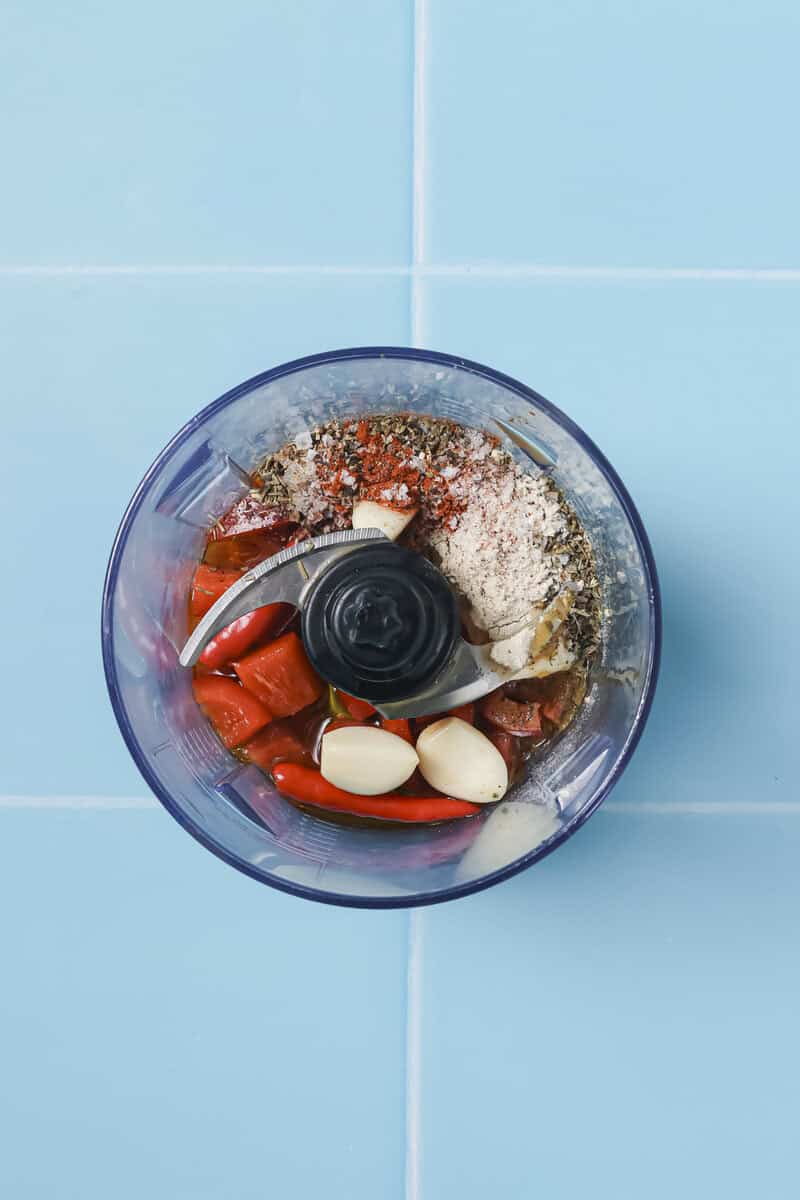 spices and garlic in food processor