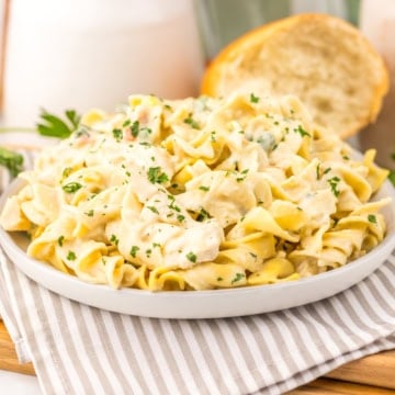 White bowl full of chicken pot pie pasta.